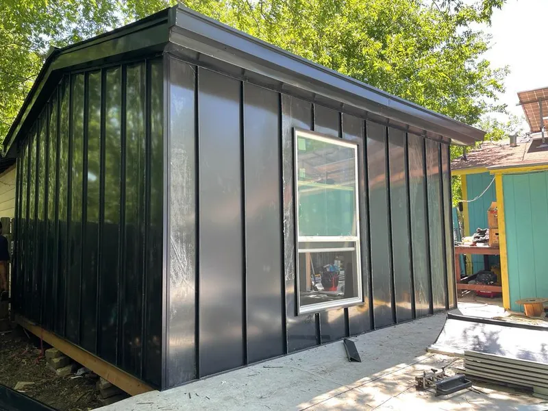 Black standing seam metal wall panels for Roof Inspection in Deerfield