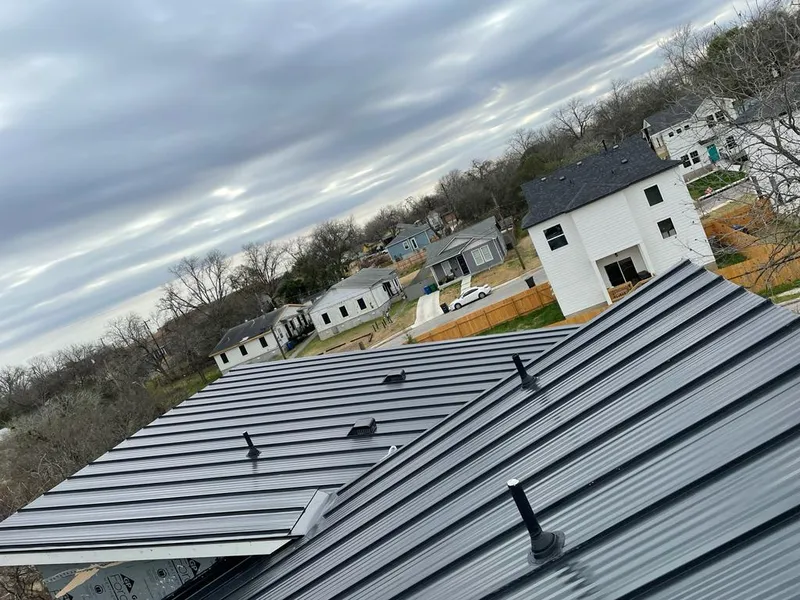 Standing seam metal roof panels with vents for Skylight Repair in Deerfield